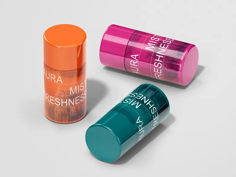 Orange, magenta and teal Aura Mist Freshness packaging colour variants.